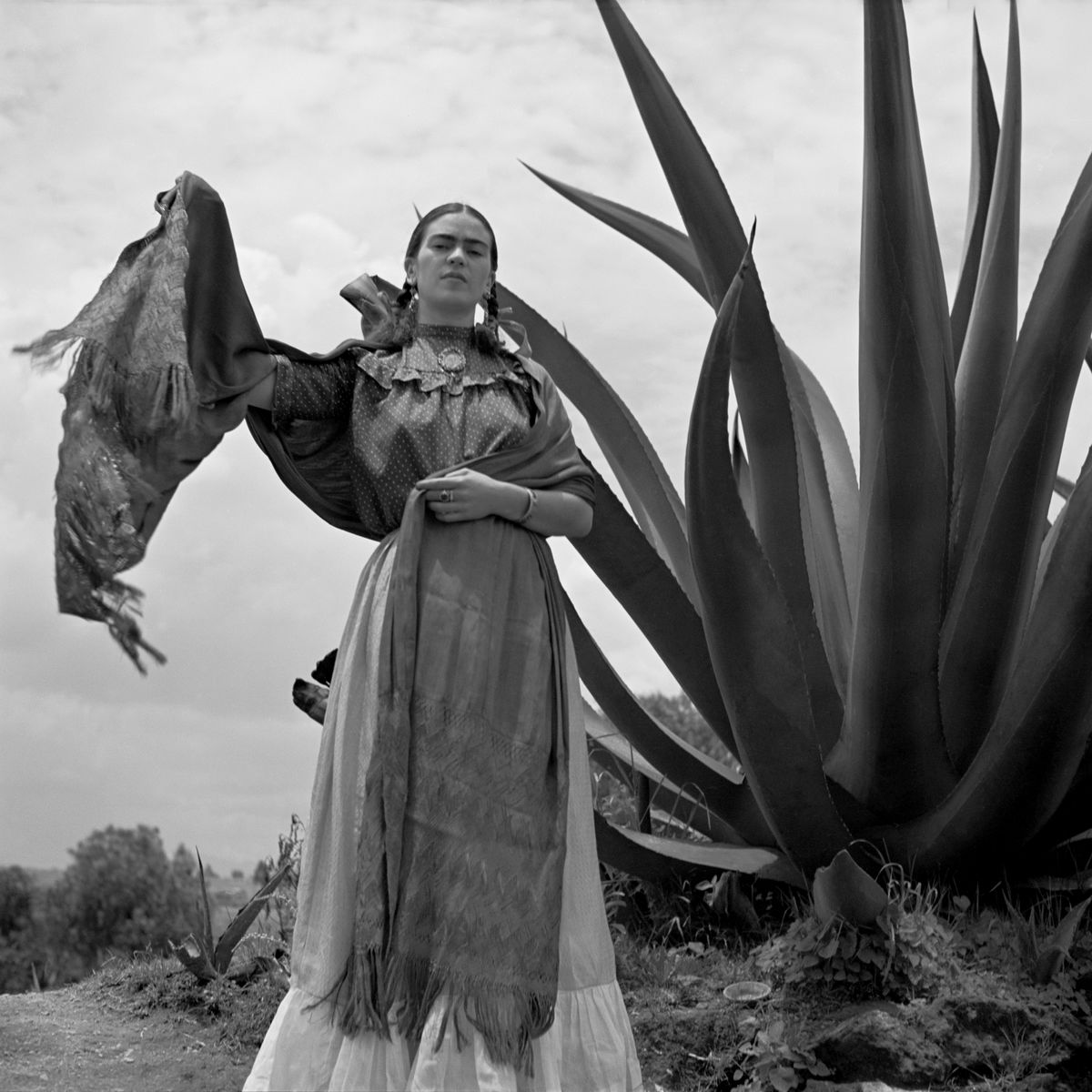 Frida Kahlo standing next to an agave plant, 'Señoras of Mexico' 1937
